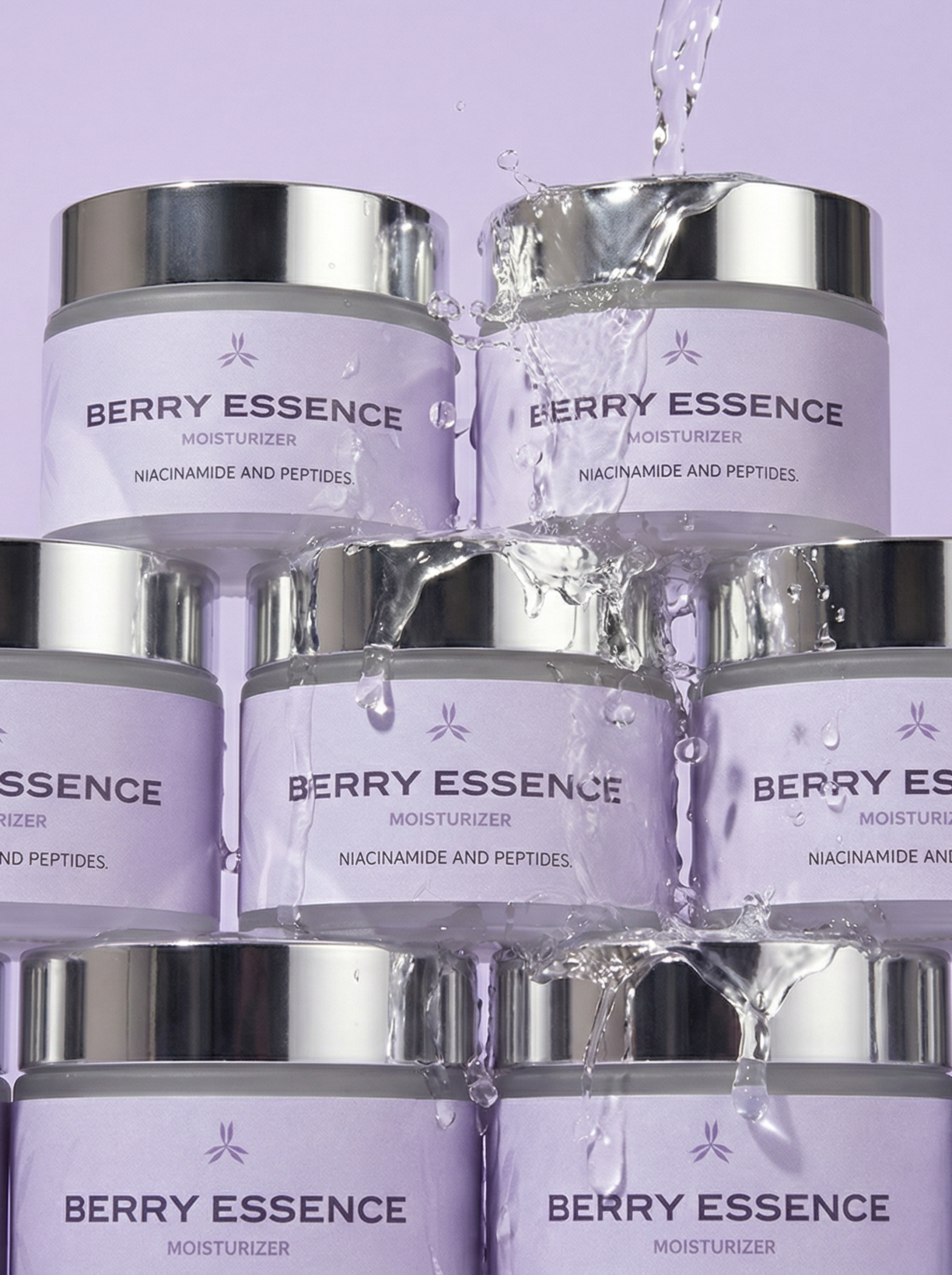 Stack of Berry Essence moisturizer jars with water droplets on a light purple background
