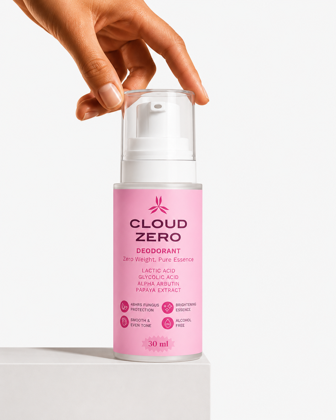 Pink Cloud Zero deodorant bottle held by a hand on a white background