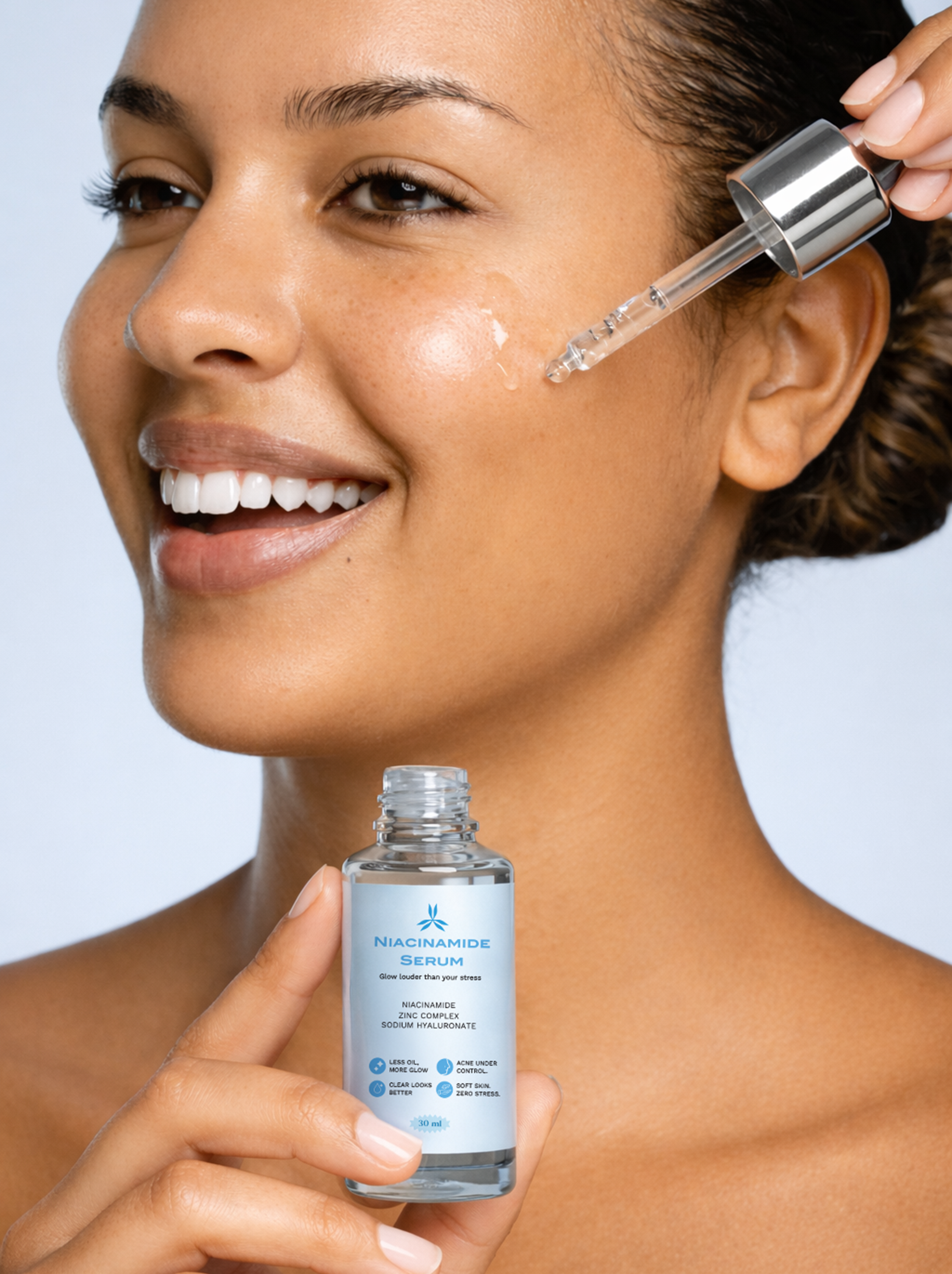 Woman applying skincare serum to her face with a dropper and holding a bottle against a light blue background